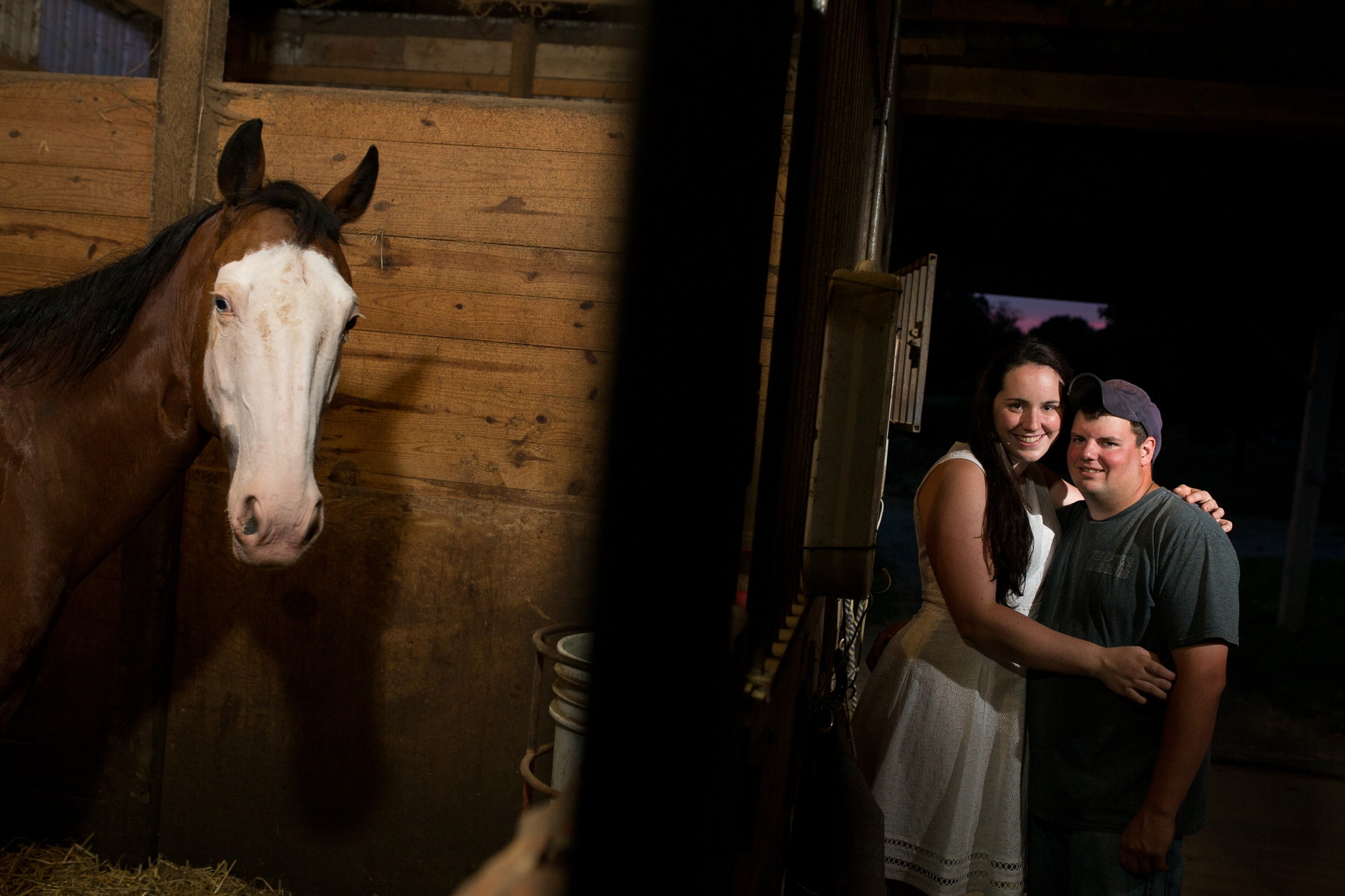 fun engagement photos at a horse farm